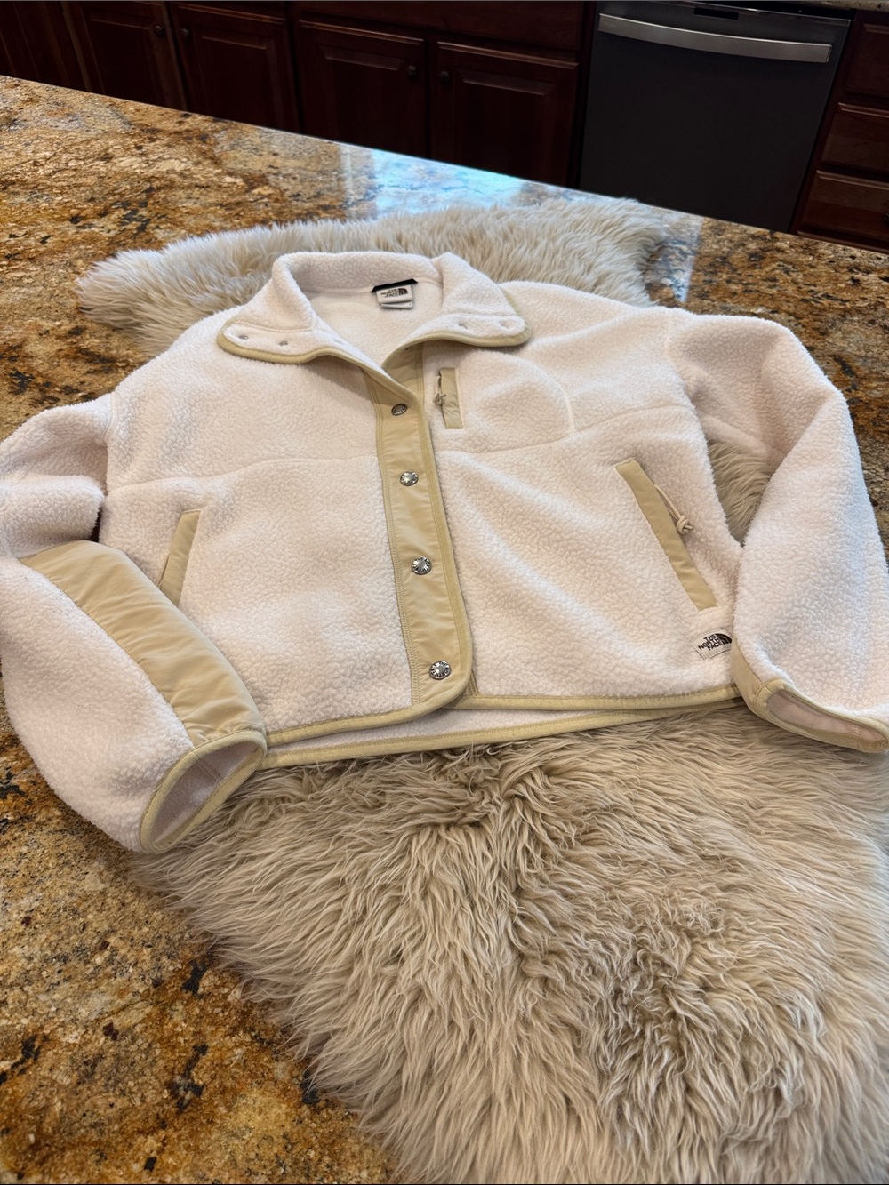 North Face Fleece size small. Cream color excellent condition!